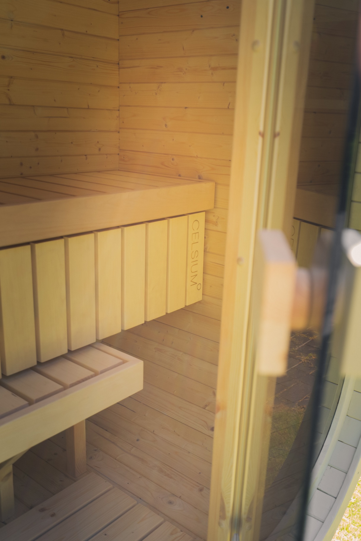 Ula Mini curved cube sauna in beige cedar finish | Signature Garden Rooms