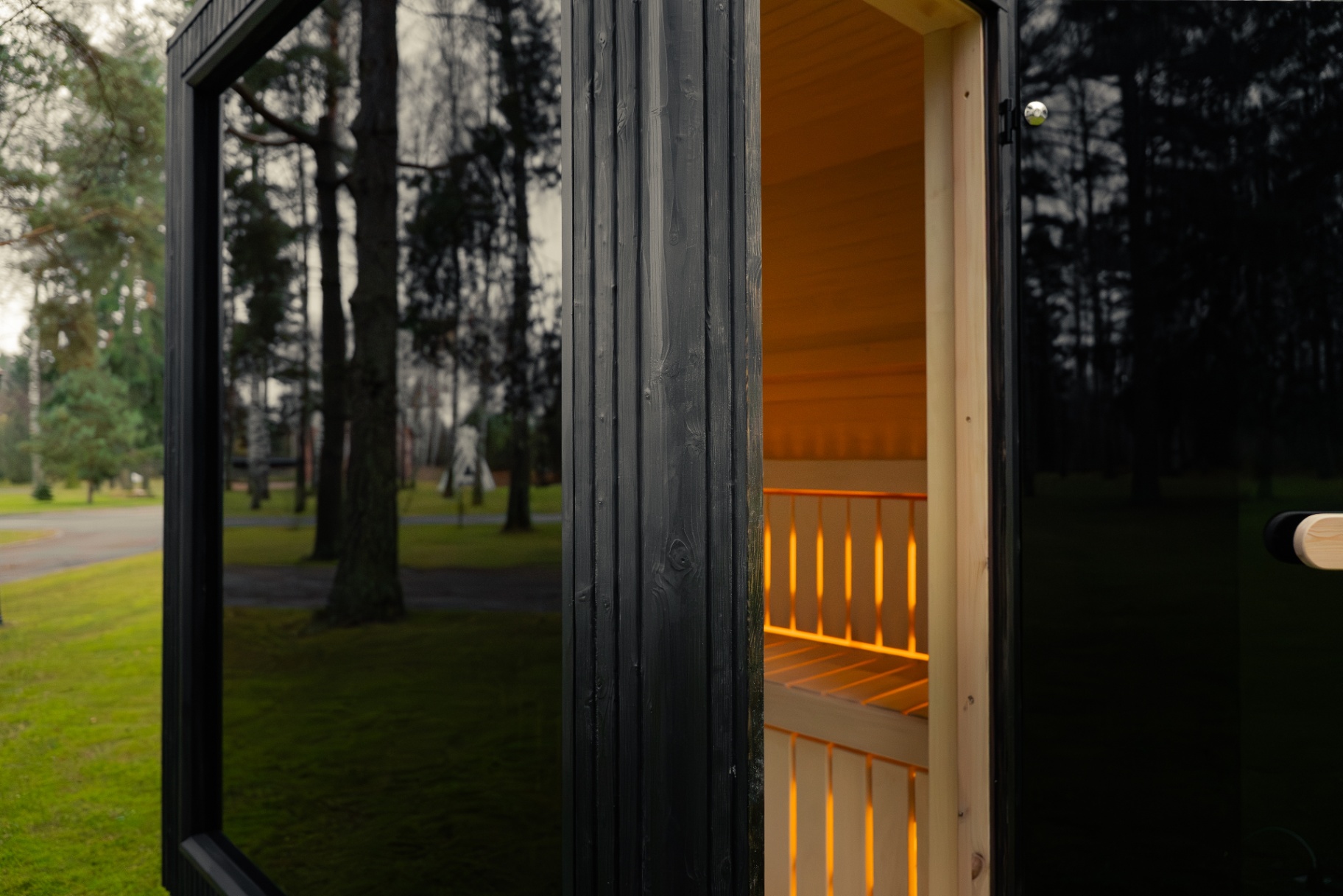 Ebony cube sauna with HUUM black glass heater | Signature Garden Rooms