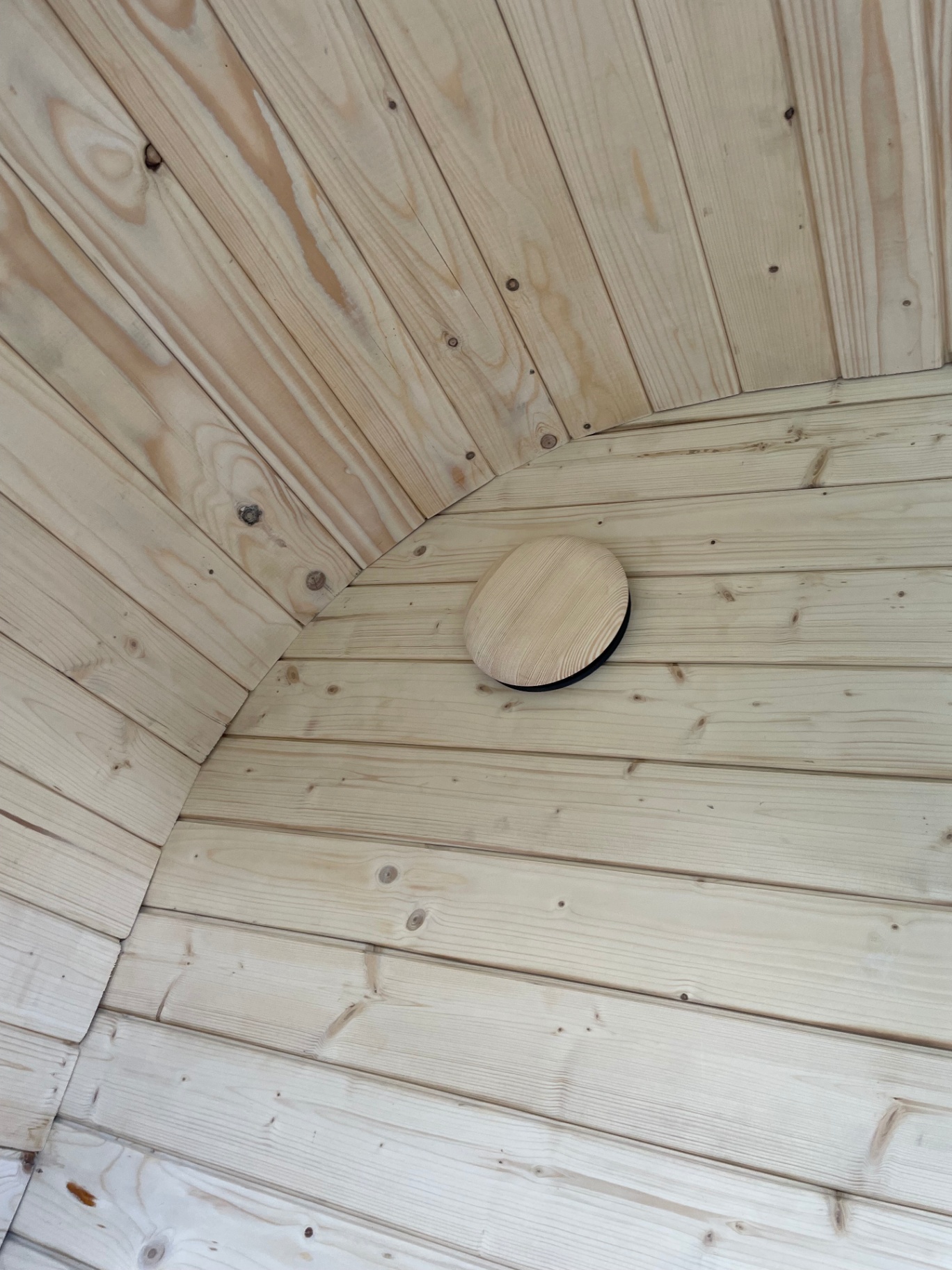 Ula Mini curved cube sauna in ebony charred finish | Signature Garden Rooms