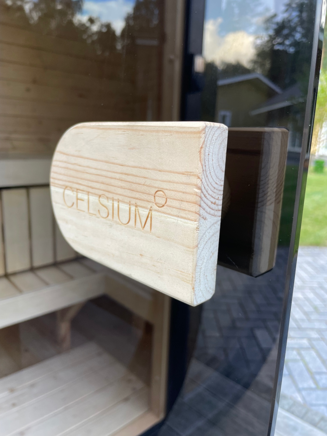 Ula Mini curved cube sauna in ebony charred finish | Signature Garden Rooms