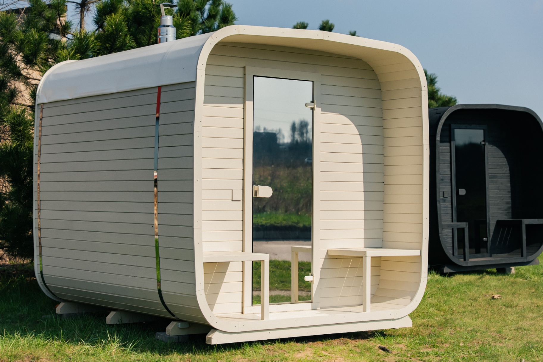 Ula L curved-corner cube sauna in beige cedar finish | Signature Garden Rooms Scotland