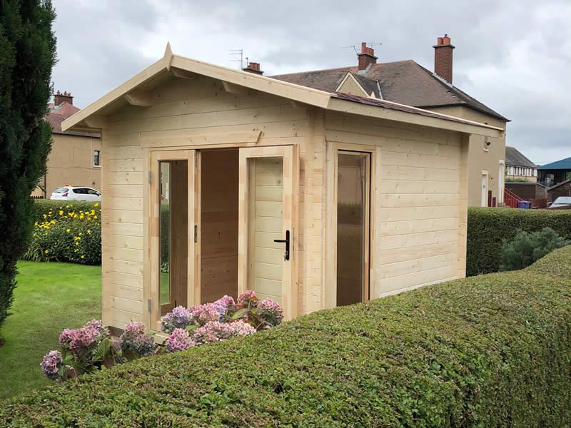 Light wood apex log cabin with double glass doors in a residential garden | Signature Garden Rooms, Central Scotland