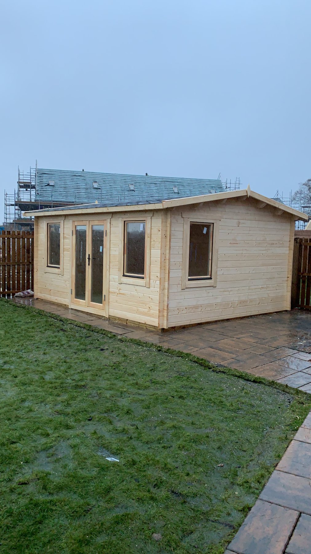 Light timber log cabin with apex roof and double doors in garden | Signature Garden Rooms, Central Scotland
