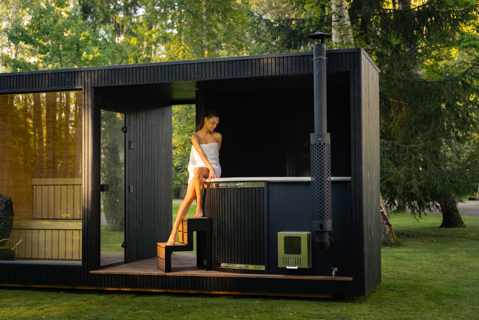 Tauras Grand ebony modular sauna | Signature Garden Rooms installation