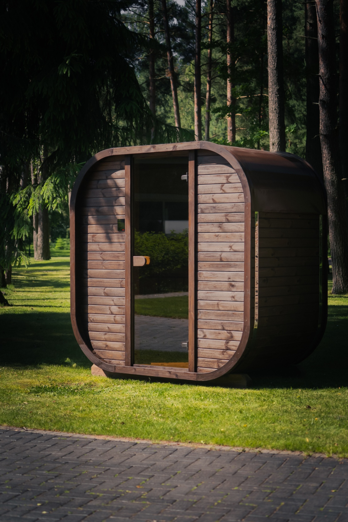 Ula Mini curved cube sauna in teak finish | Signature Garden Rooms