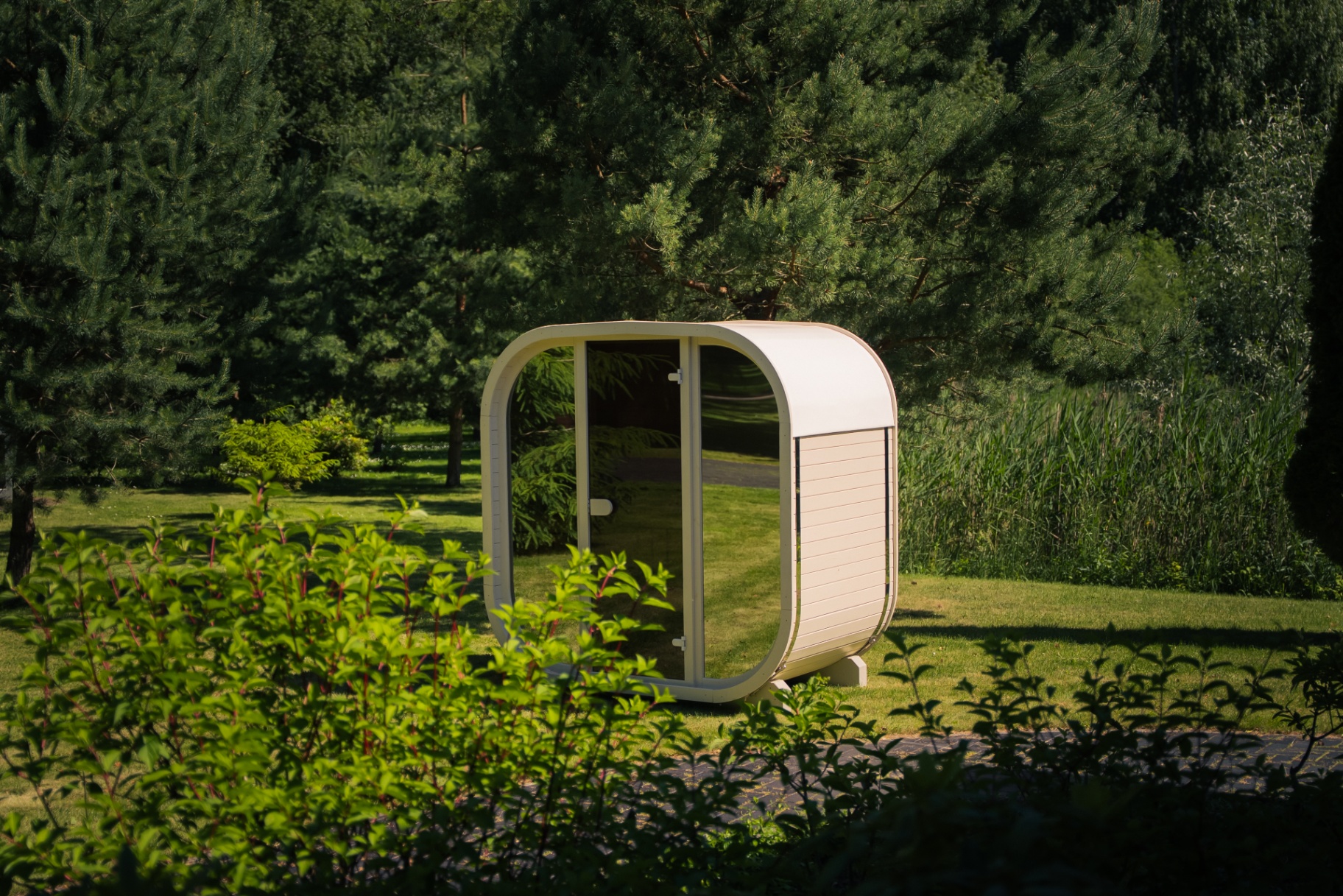 Ula Mini curved cube sauna in beige cedar finish | Signature Garden Rooms