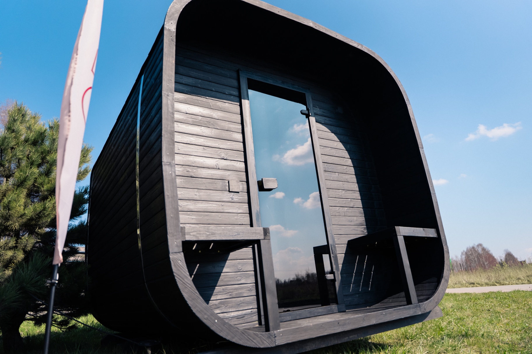 Ula L curved-corner cube sauna in ebony charred finish | Signature Garden Rooms Scotland