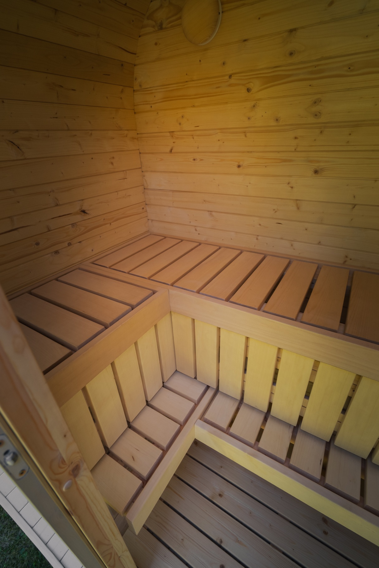 Ula Mini curved cube sauna in beige cedar finish | Signature Garden Rooms