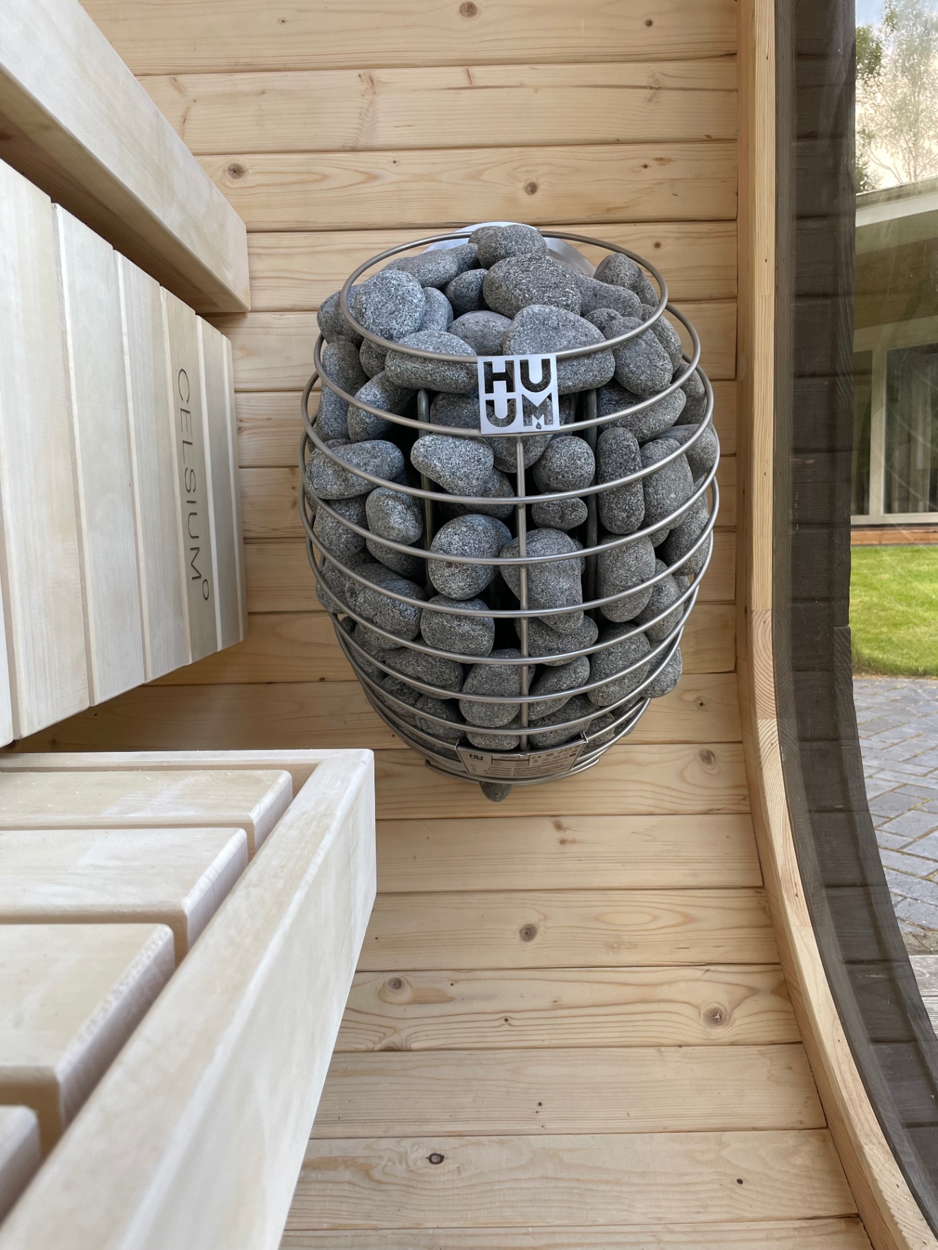 Ula Mini curved cube sauna in ebony charred finish | Signature Garden Rooms