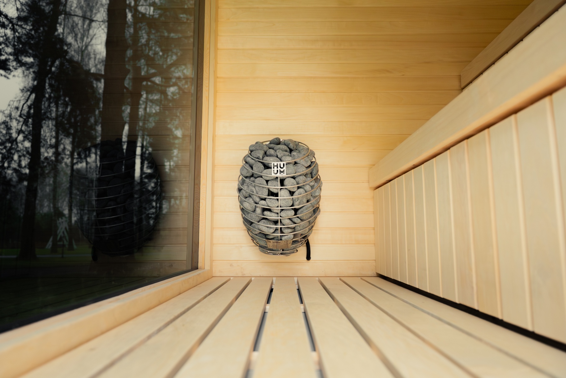 Ebony cube sauna with HUUM black glass heater | Signature Garden Rooms