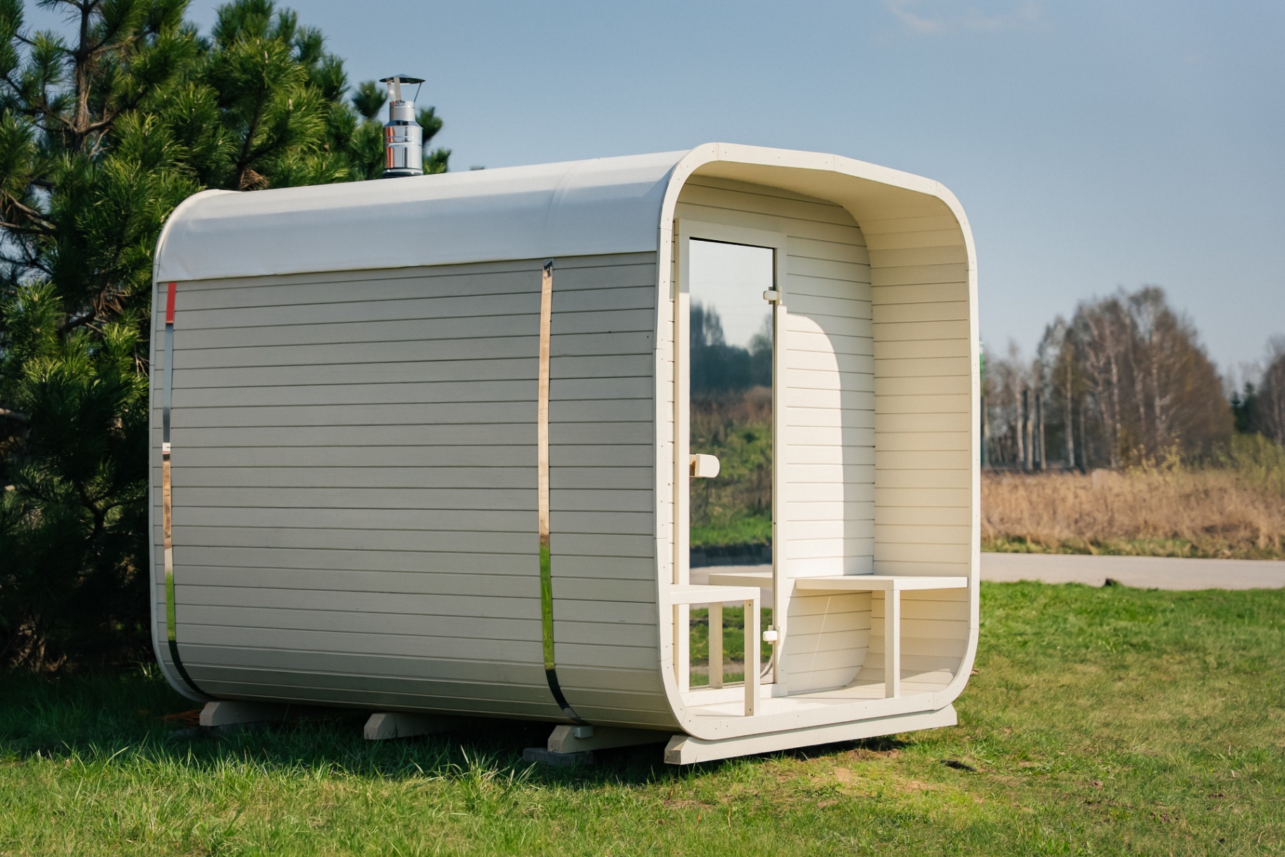 Ula L curved-corner cube sauna in beige cedar finish | Signature Garden Rooms Scotland