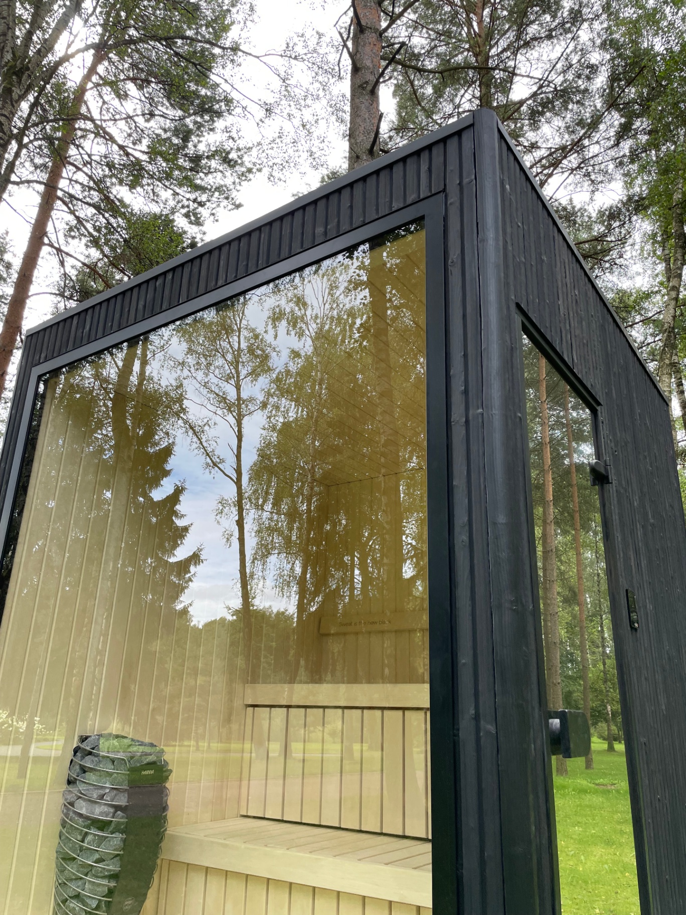 Jonas S compact barrel sauna in ebony finish | Signature Garden Rooms