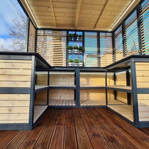 Modern wooden outdoor kitchen canopy with slatted walls and integrated counter shelving | Signature Garden Rooms, Central Scotland