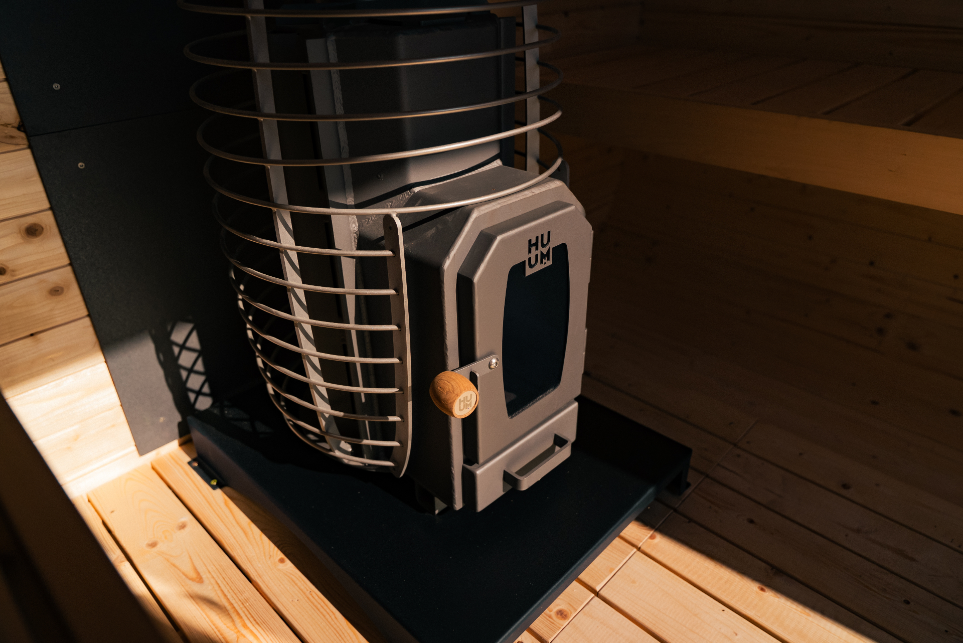 Ula L curved-corner cube sauna in beige cedar finish | Signature Garden Rooms Scotland
