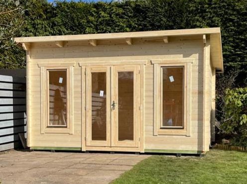 Unfinished light timber log cabin with pent roof and central double glass doors | Signature Garden Rooms, Central Scotland