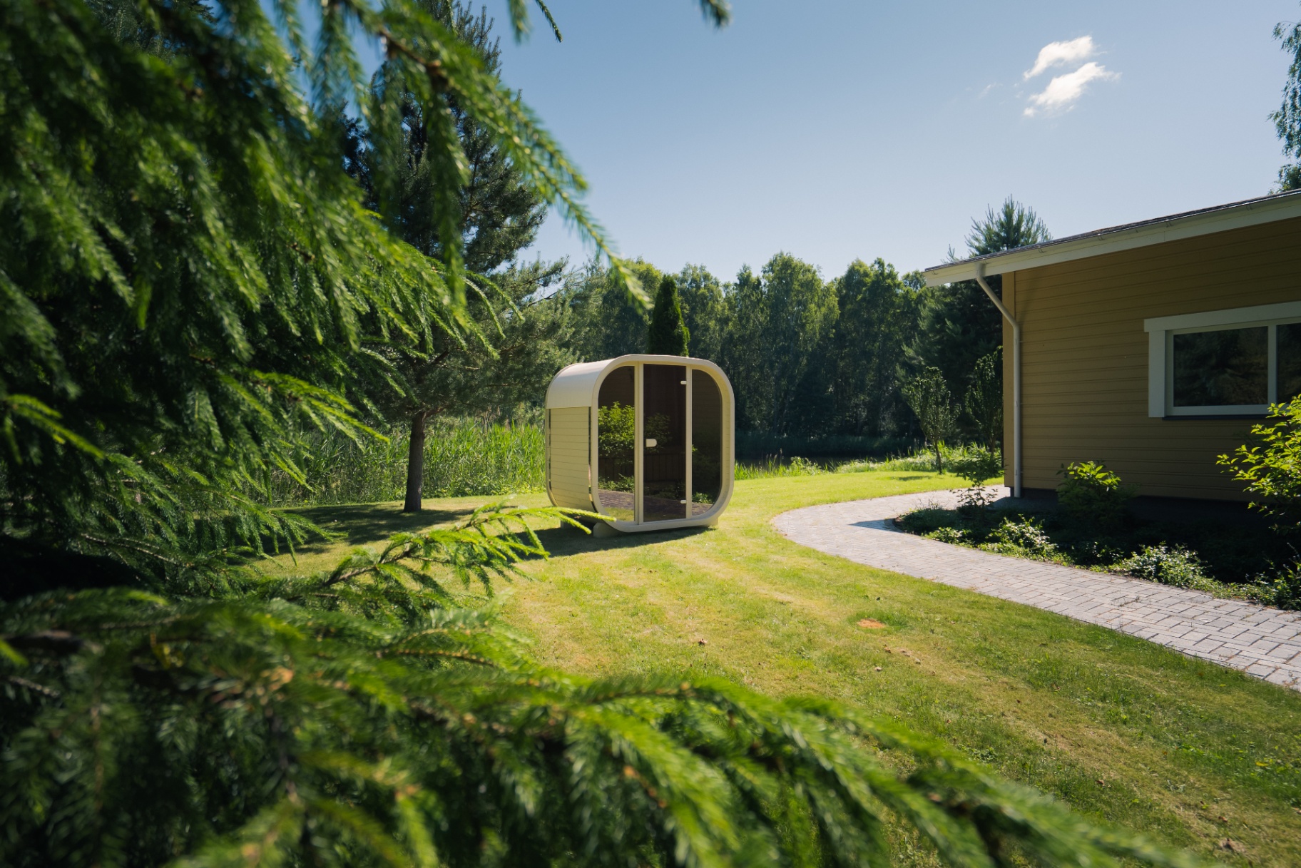 Ula Mini curved cube sauna in beige cedar finish | Signature Garden Rooms