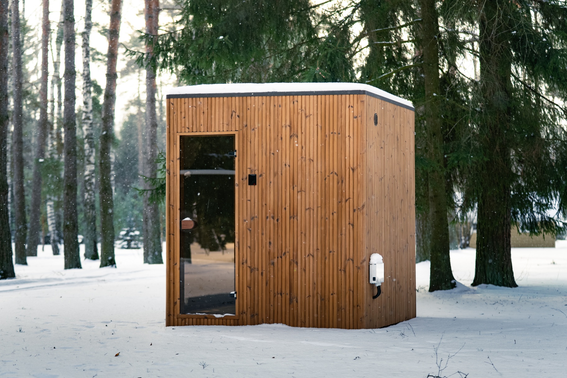 Jonas teak barrel sauna in Scottish winter | Signature Garden Rooms