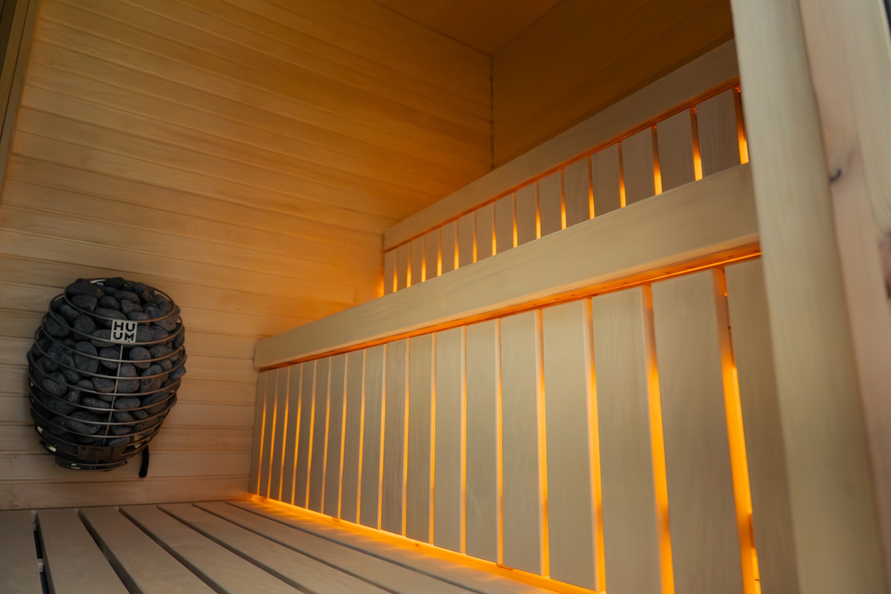 Ebony cube sauna with HUUM black glass heater | Signature Garden Rooms