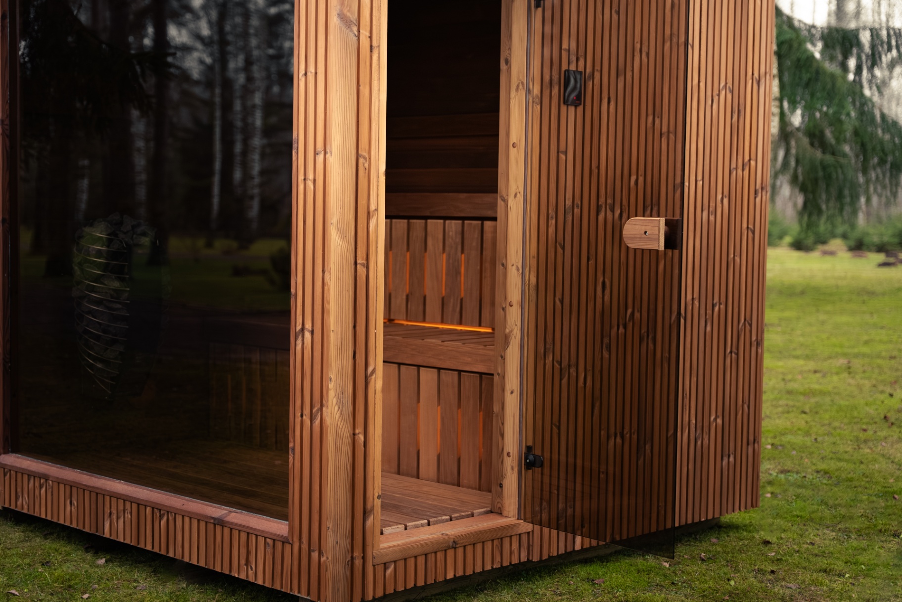 Teak barrel sauna with Harvia Spirit heater | Signature Garden Rooms