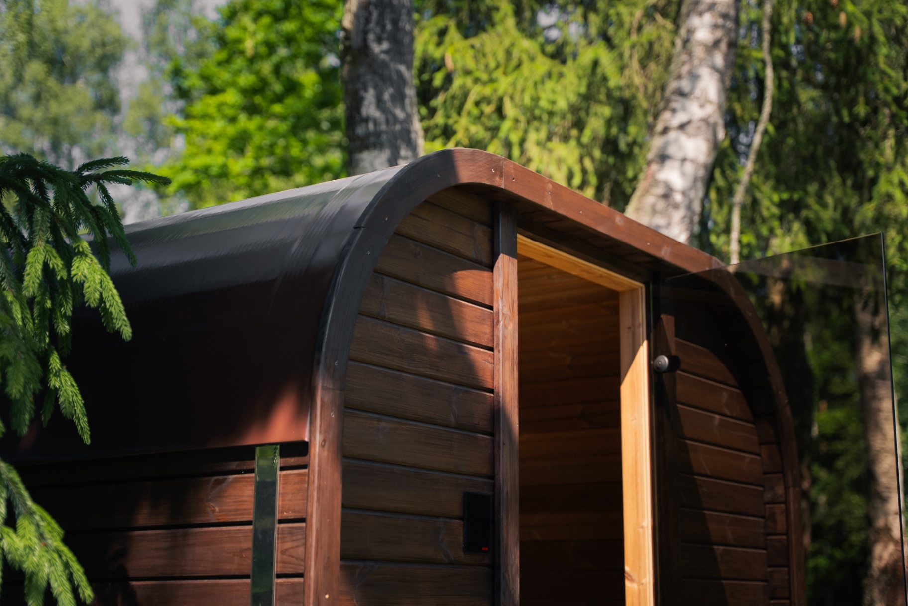 Ula Mini curved cube sauna in teak finish | Signature Garden Rooms