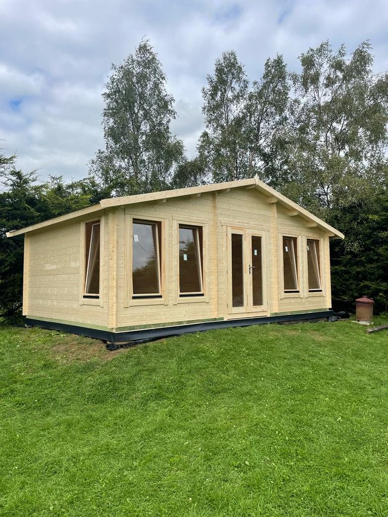 Large interlocking timber log cabin featuring apex roof and tilt turn windows | Signature Garden Rooms, Central Scotland