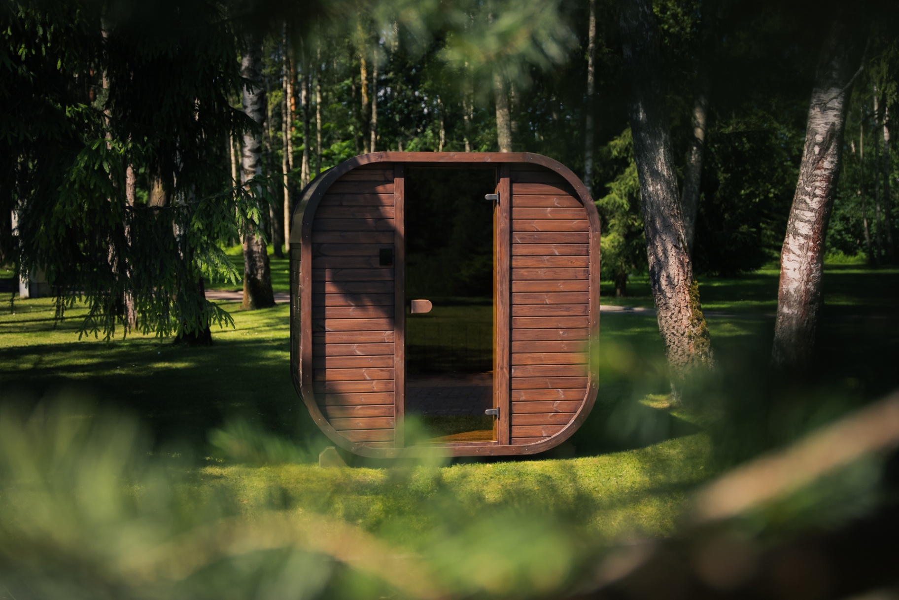 Ula Mini curved cube sauna in teak finish | Signature Garden Rooms