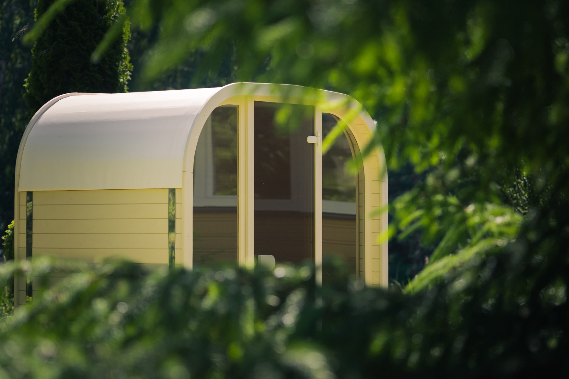 Ula Mini curved cube sauna in beige cedar finish | Signature Garden Rooms