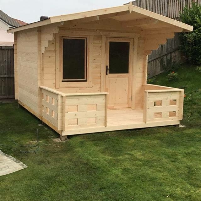 Small untreated timber log cabin with apex overhang roof and front veranda | Signature Garden Rooms, Central Scotland