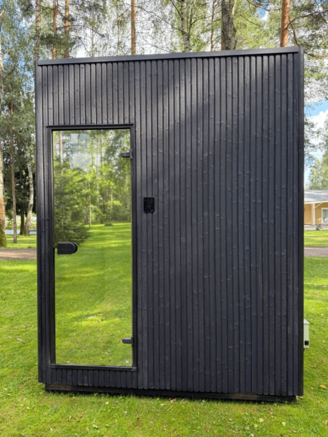 Jonas S compact barrel sauna in ebony finish | Signature Garden Rooms