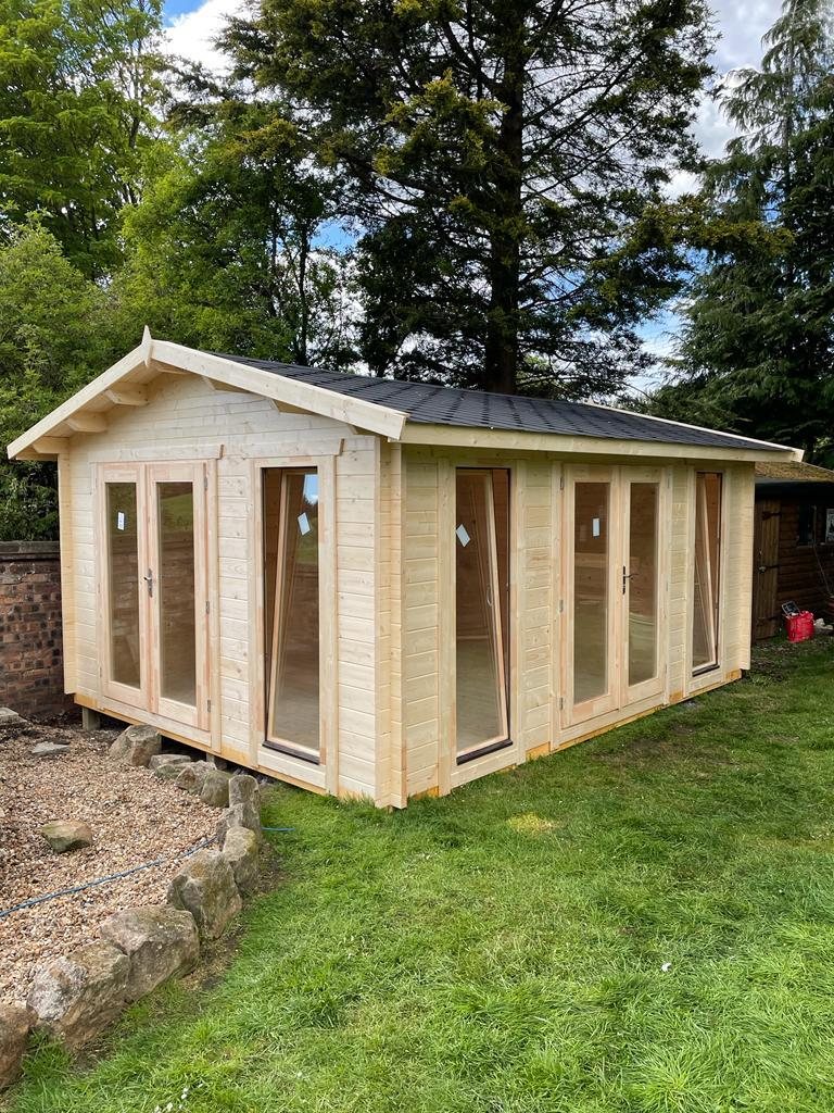 Large light timber log cabin with apex roof and multiple glass doors | Signature Garden Rooms, Central Scotland