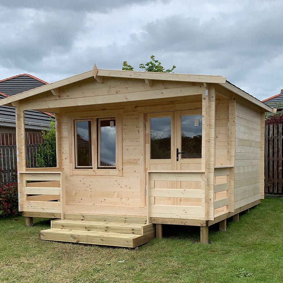 Light wood log cabin with covered front porch and double glass doors | Signature Garden Rooms, Central Scotland
