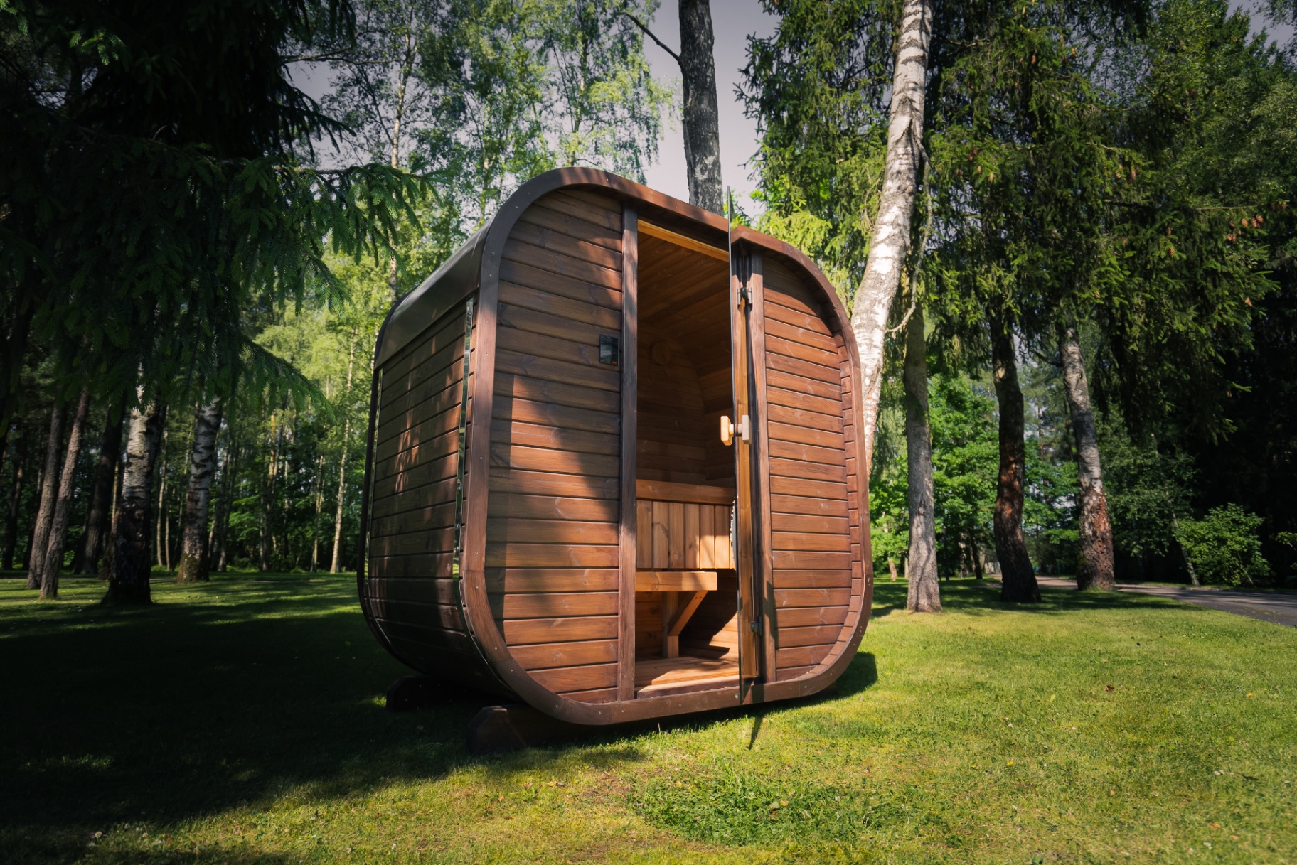 Ula Mini curved cube sauna in teak finish | Signature Garden Rooms