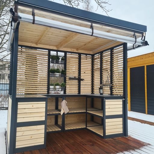 A modern timber and metal covered outdoor kitchen canopy structure with shelving | Signature Garden Rooms, Central Scotland