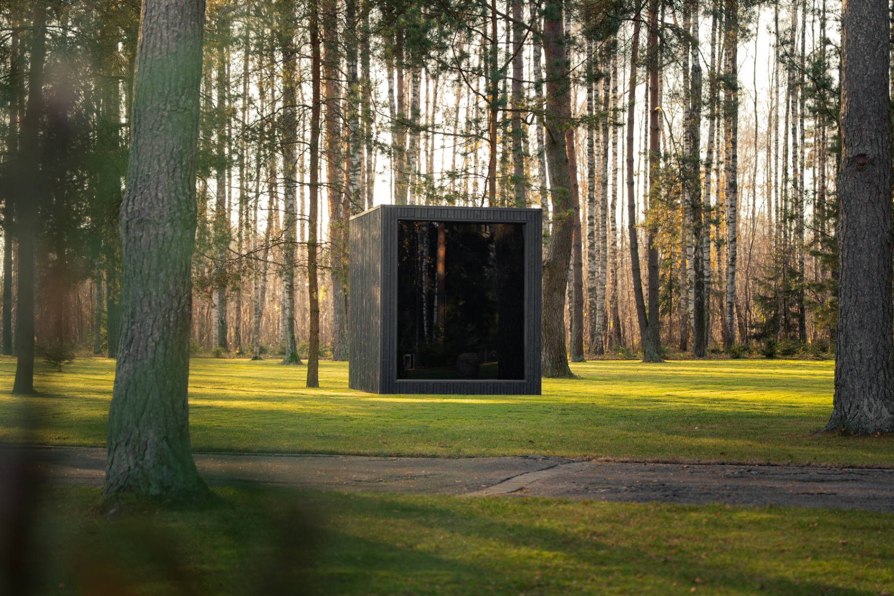 Ebony cube sauna with HUUM black glass heater | Signature Garden Rooms