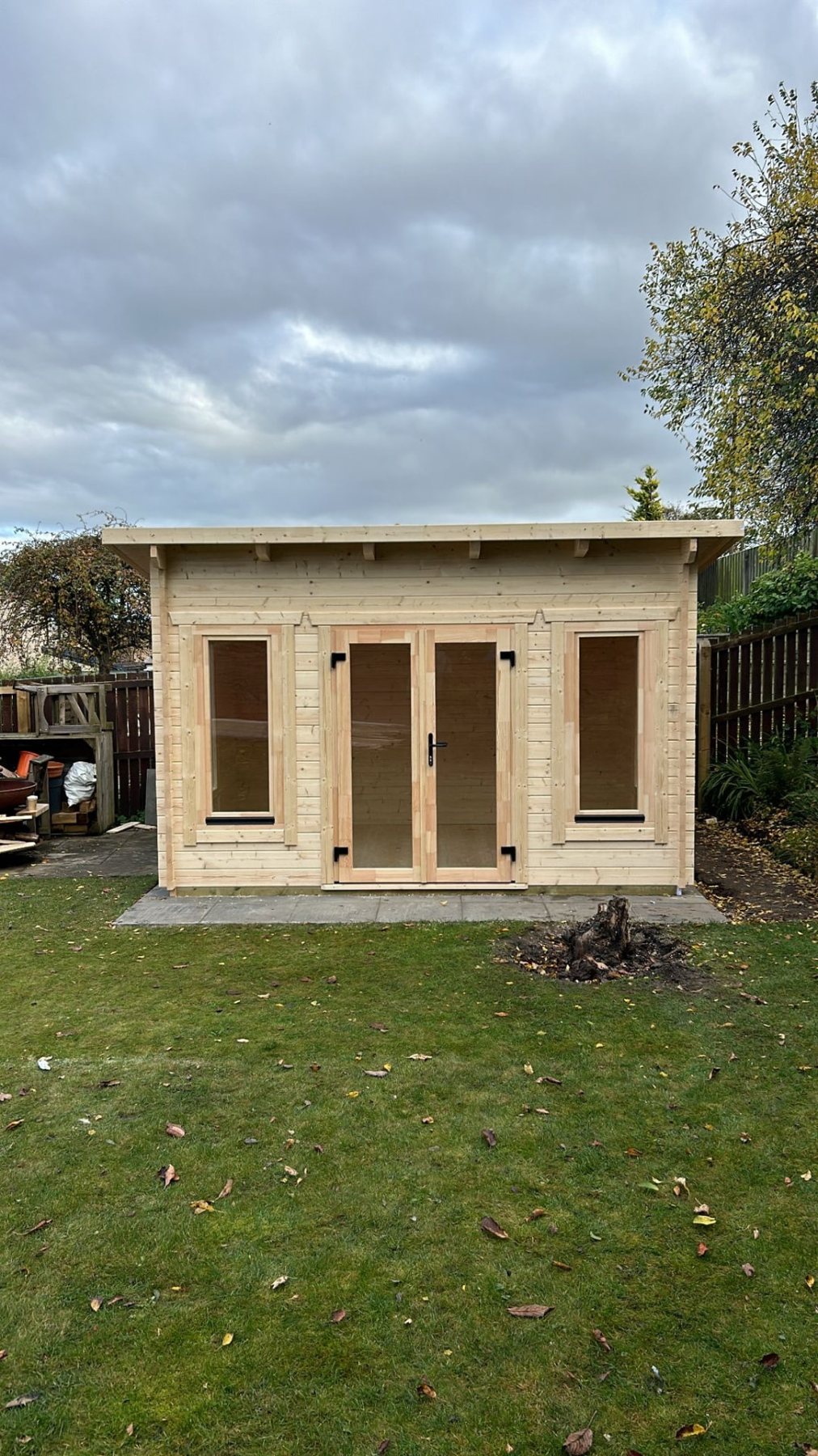 Natural timber pent log cabin with double glass doors and two side windows | Signature Garden Rooms, Central Scotland