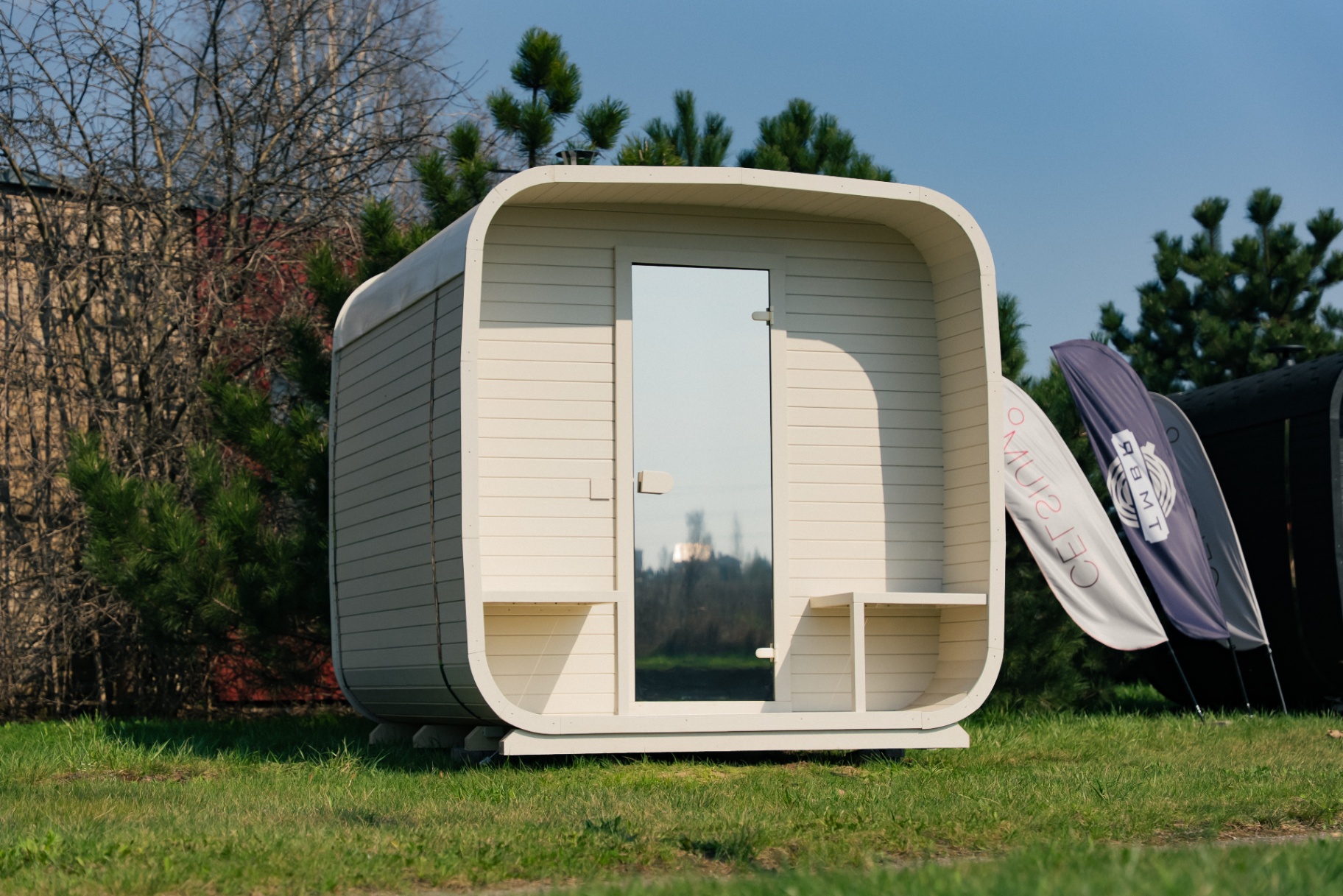 Ula L curved-corner cube sauna in beige cedar finish | Signature Garden Rooms Scotland