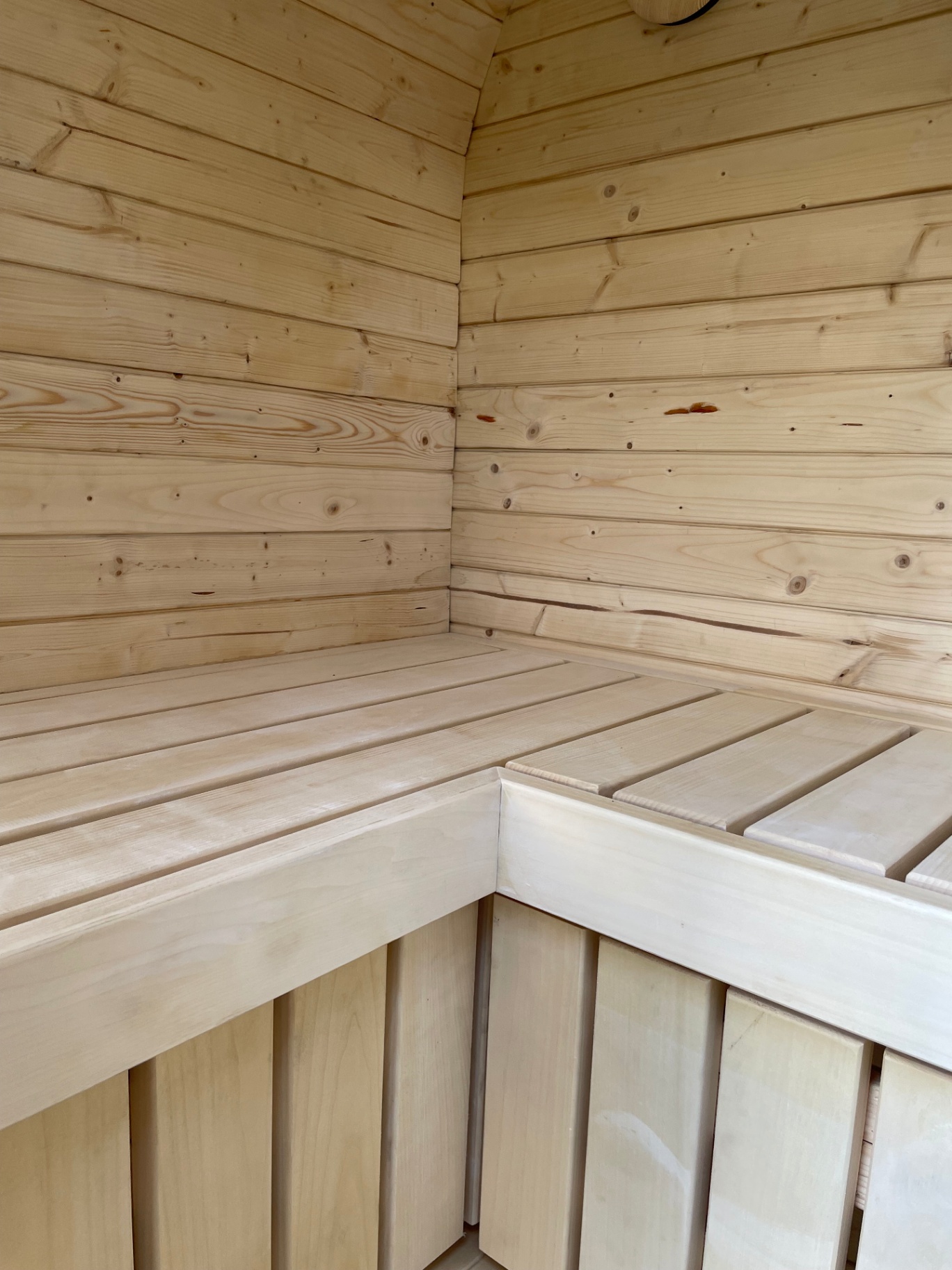 Ula Mini curved cube sauna in ebony charred finish | Signature Garden Rooms