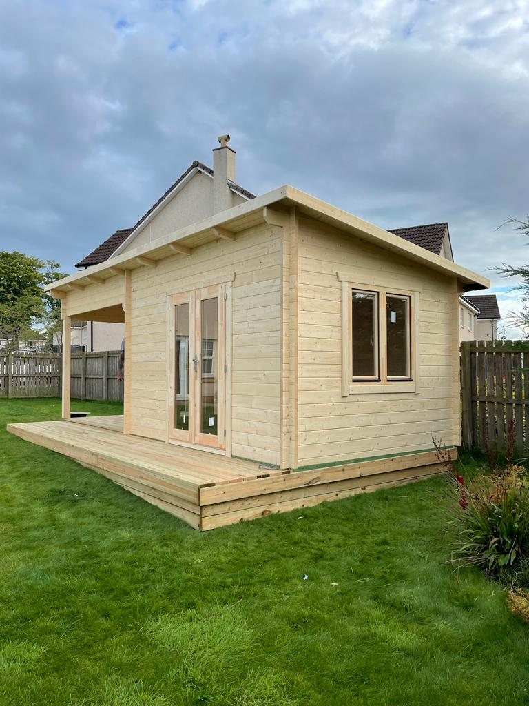 Light timber log cabin with glass double doors, side window, and raised decking | Signature Garden Rooms, Central Scotland