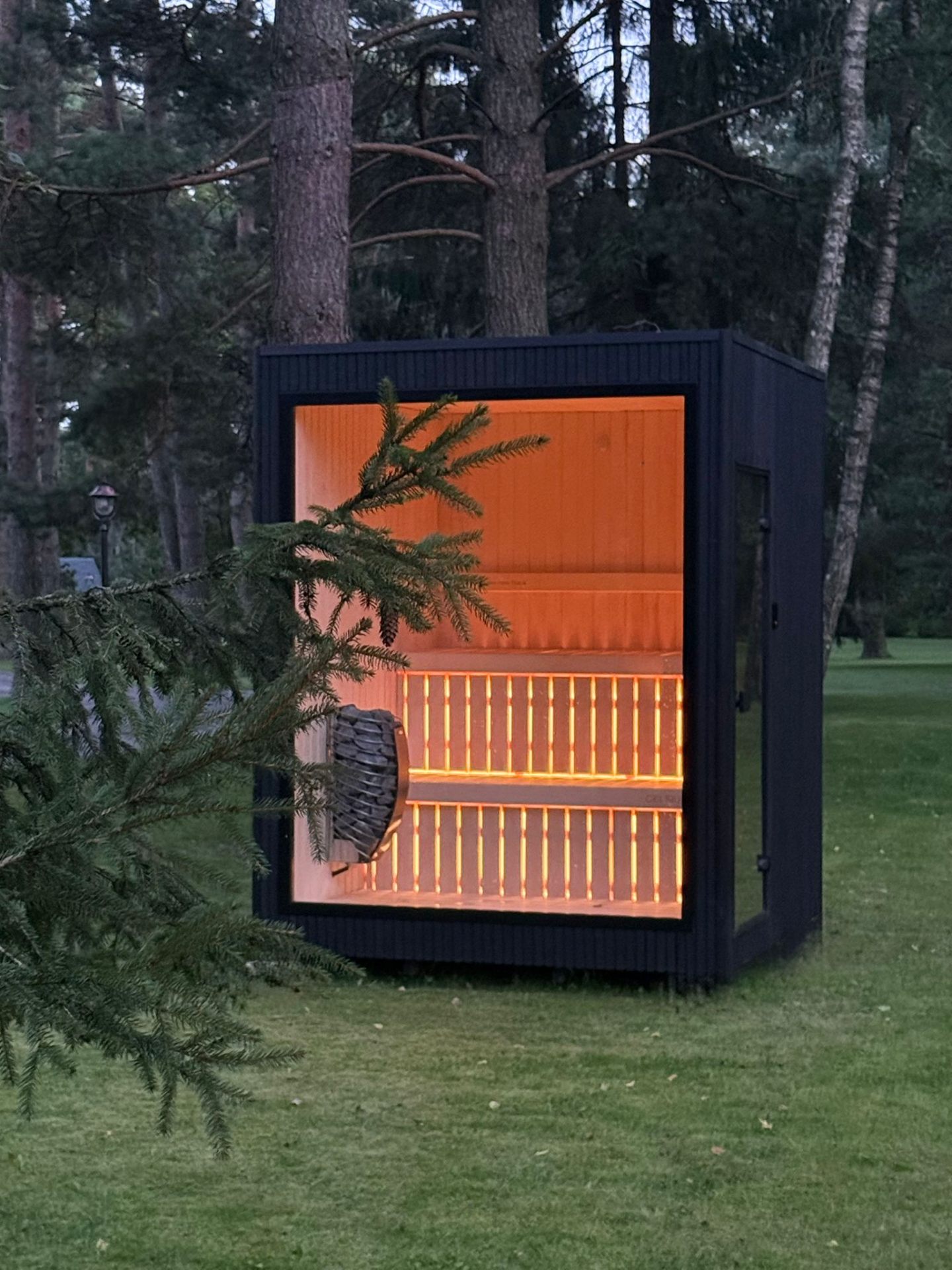 Jonas S compact barrel sauna in ebony finish | Signature Garden Rooms