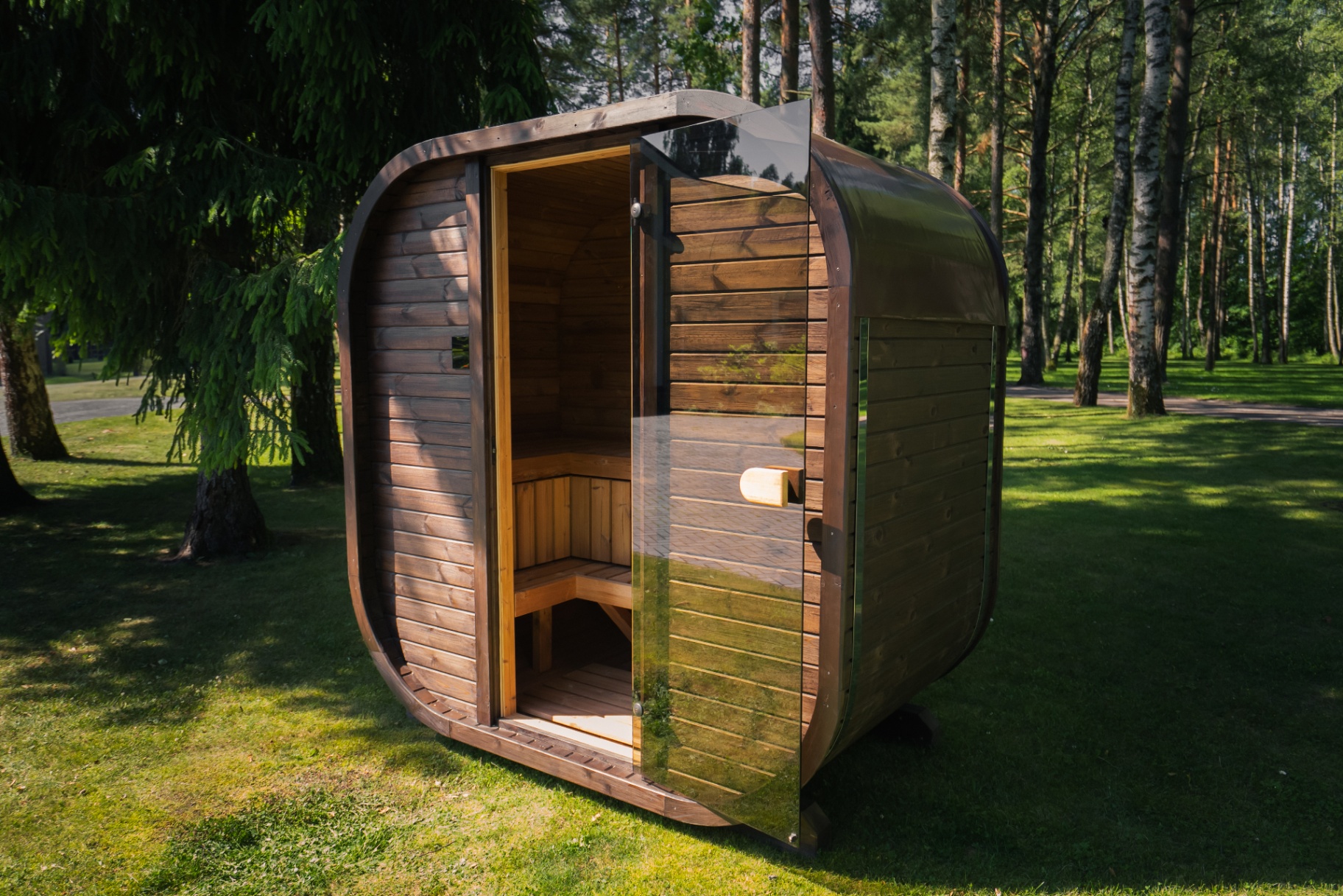 Ula Mini curved cube sauna in teak finish | Signature Garden Rooms