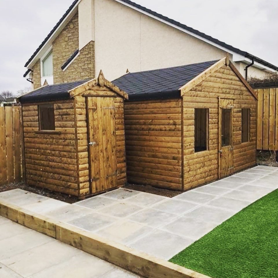 Wooden apex timber summerhouse with attached side store on a paved patio | Signature Garden Rooms, Central Scotland