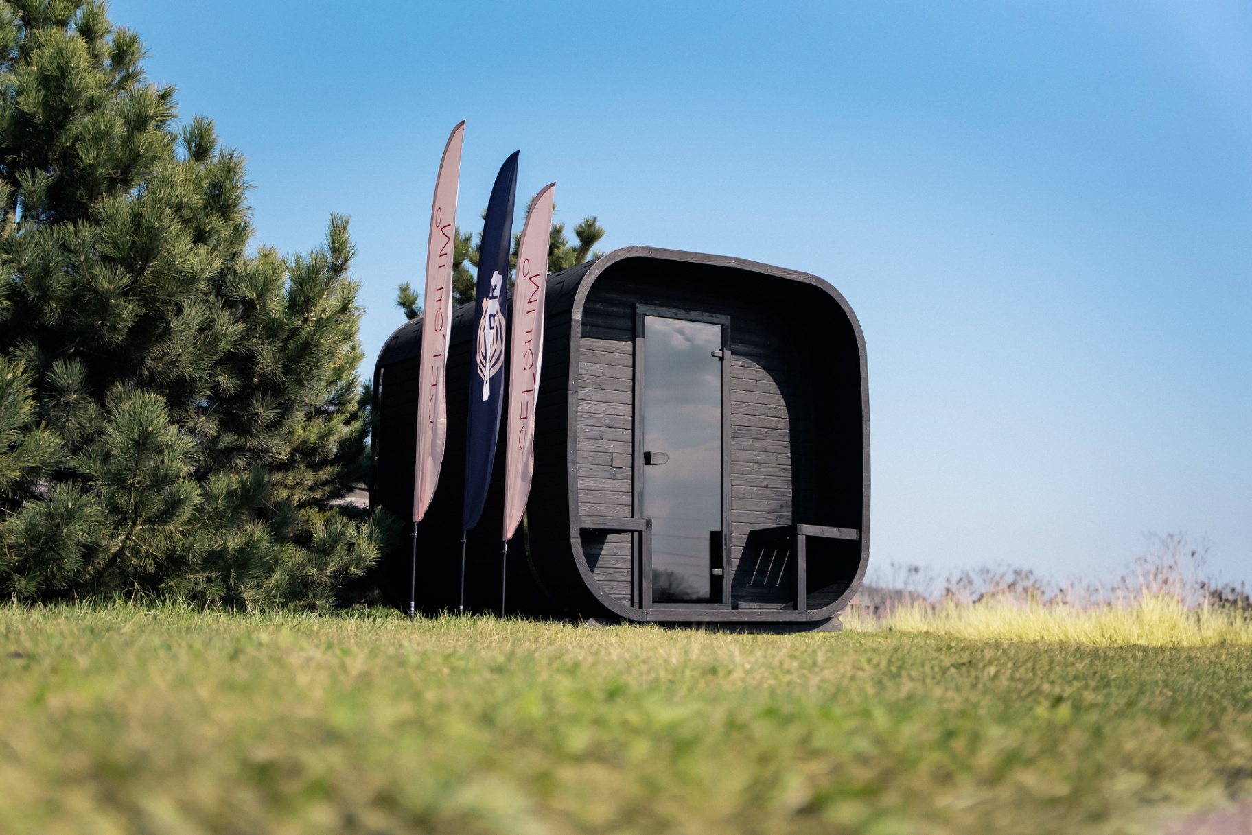 Ula L curved-corner cube sauna in ebony charred finish | Signature Garden Rooms Scotland
