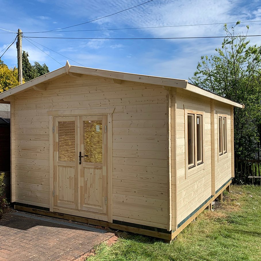 Unpainted apex roof timber log cabin with glazed double doors and side windows | Signature Garden Rooms, Central Scotland